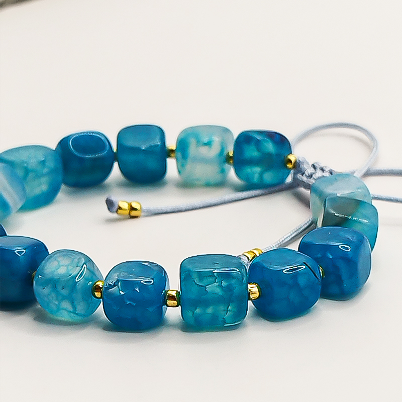 دستبند سنگ عقیق آبی و منجوق میوکی بلتا گالری مدل مهشید 14 دستبند سنگ عقیق آبی قابل تنظیم برای همه