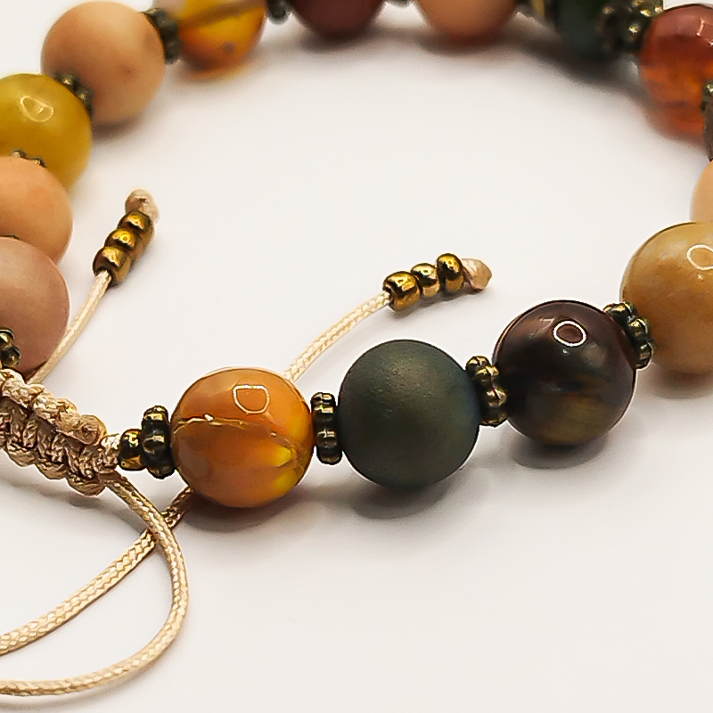 دستبند سنگی بلتاگالری مدل هیرو با آویز کاموا برنجی 4 دستبند سنگی بلتاگالری مدل هیرو با آویز کاموا برنجی