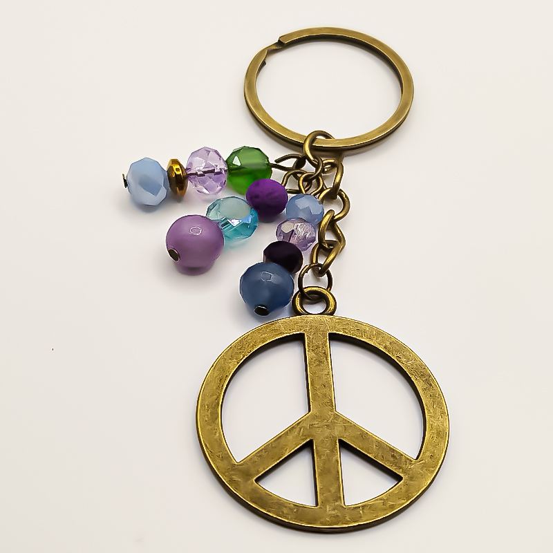 جاکلیدی برنجی بلتاگالری با آویز صلح 6 جاکلیدی برنجی بلتاگالری با آویز صلح