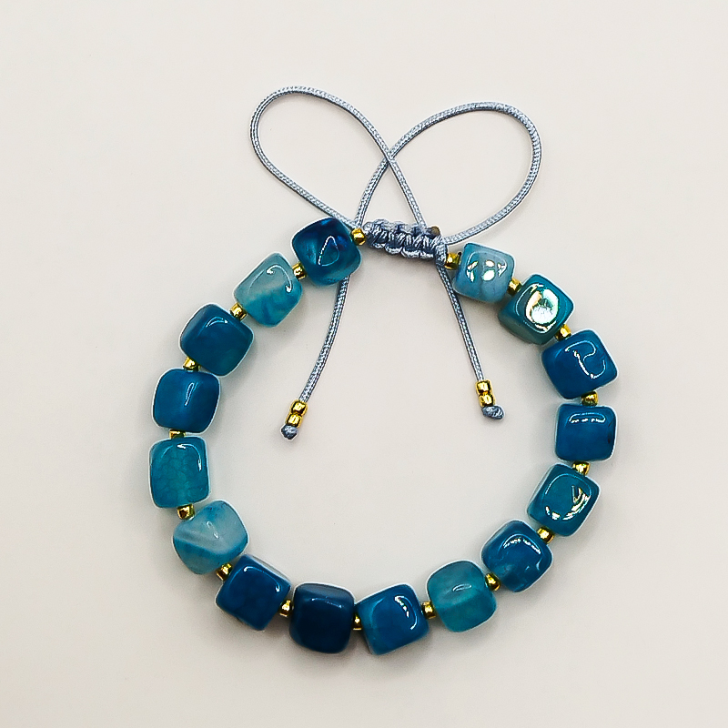 دستبند سنگ عقیق آبی و منجوق میوکی بلتا گالری مدل مهشید 12 دستبند سنگ عقیق آبی آرامشبخش