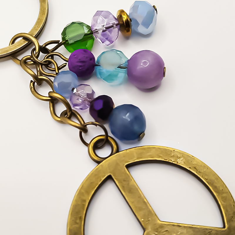 جاکلیدی برنجی بلتاگالری با آویز صلح 3 جاکلیدی برنجی بلتاگالری با آویز صلح