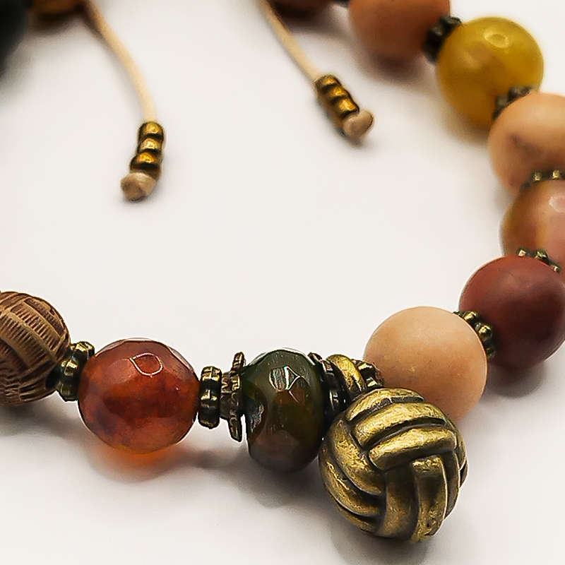 دستبند سنگی بلتاگالری مدل هیرو با آویز کاموا برنجی 5 دستبند سنگی بلتاگالری مدل هیرو با آویز کاموا برنجی