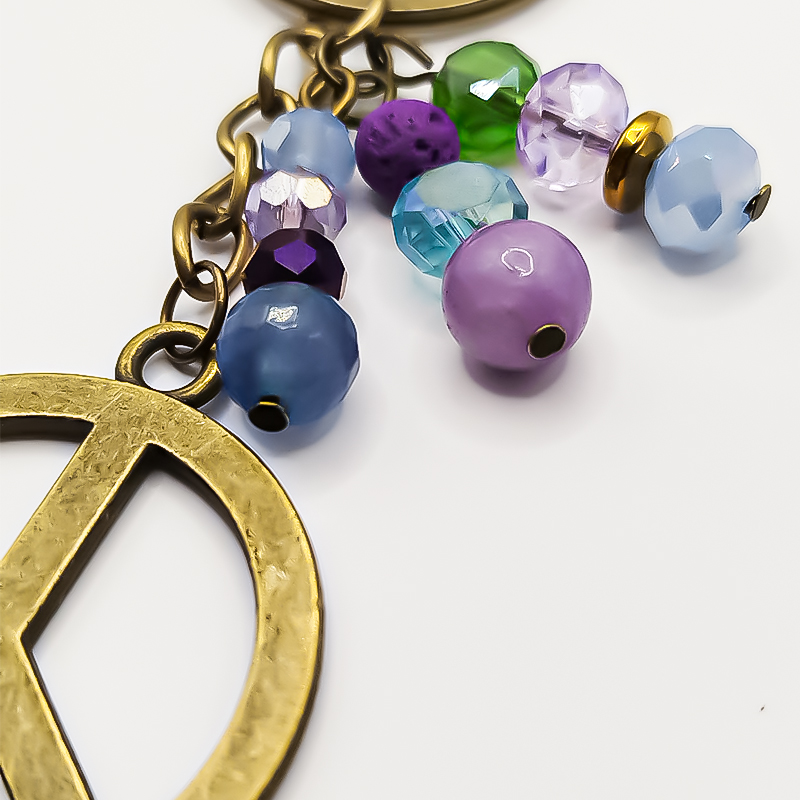 جاکلیدی برنجی بلتاگالری با آویز صلح 4 جاکلیدی برنجی بلتاگالری با آویز صلح